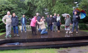 Linlithgow Players on the rain-soaked stage where they were due to perform. (PHOTO: PHIL MANSELL)